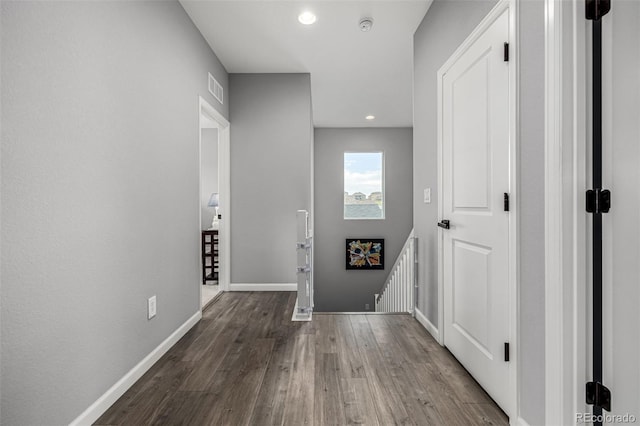 9406 Bross St, Arvada, CO 80007 - hall featuring wood finished floors, an upstairs landing, and recessed lighting