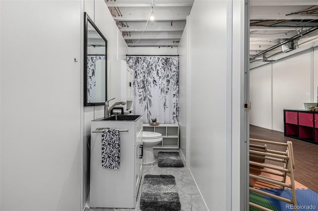 9406 Bross St, Arvada, CO 80007 - full bath with marble finish floors and vanity