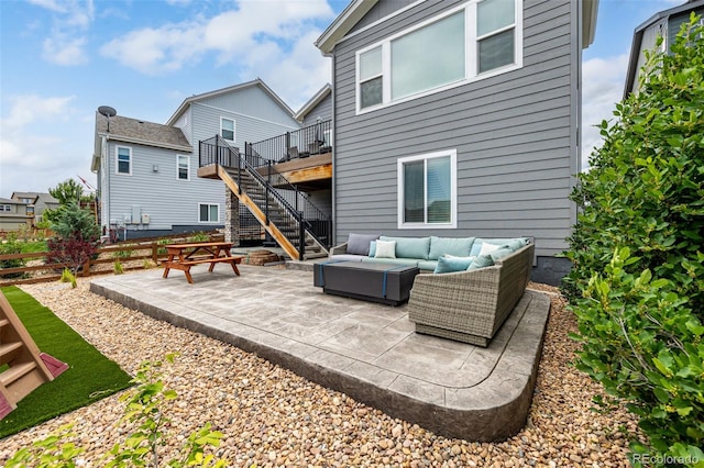 9406 Bross St, Arvada, CO 80007 - view of patio / terrace with outdoor lounge area, stairway, and a deck