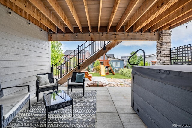 9406 Bross St, Arvada, CO 80007 - view of patio featuring stairway, a playground, and an outdoor living space