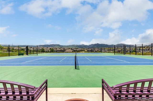 9406 Bross St, Arvada, CO 80007 - view of tennis court with community basketball court and a mountain view