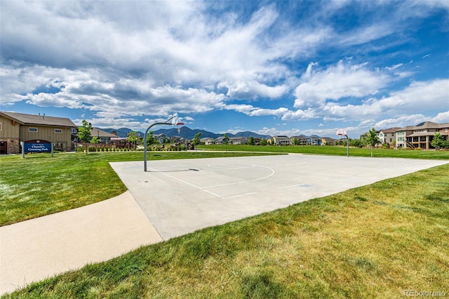 9406 Bross St, Arvada, CO 80007 - view of sport court with community basketball court, a residential view, and a lawn
