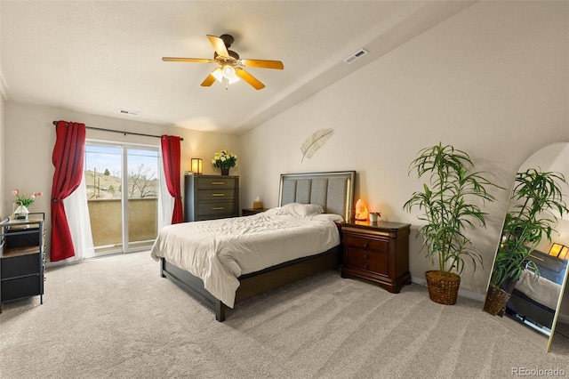 bedroom featuring access to exterior, ceiling fan, light carpet, and vaulted ceiling