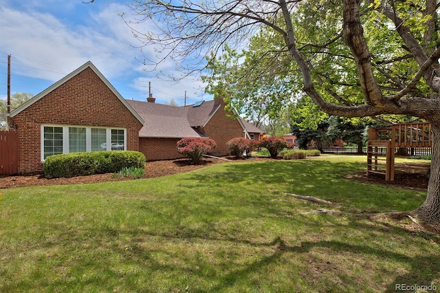 2500 Locust St, Denver, CO 80207 - view of side of home featuring brick siding, a wooden deck, and a shingled roof