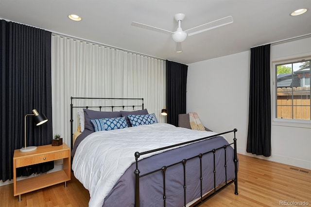 2500 Locust St, Denver, CO 80207 - bedroom featuring light wood finished floors, baseboards, recessed lighting, and ceiling fan