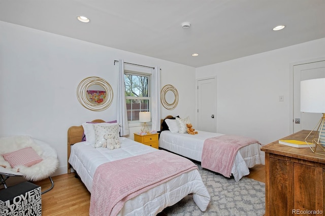 2500 Locust St, Denver, CO 80207 - bedroom featuring light wood-style flooring and recessed lighting