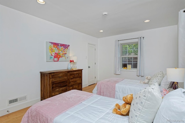 2500 Locust St, Denver, CO 80207 - bedroom featuring light wood-style floors and recessed lighting