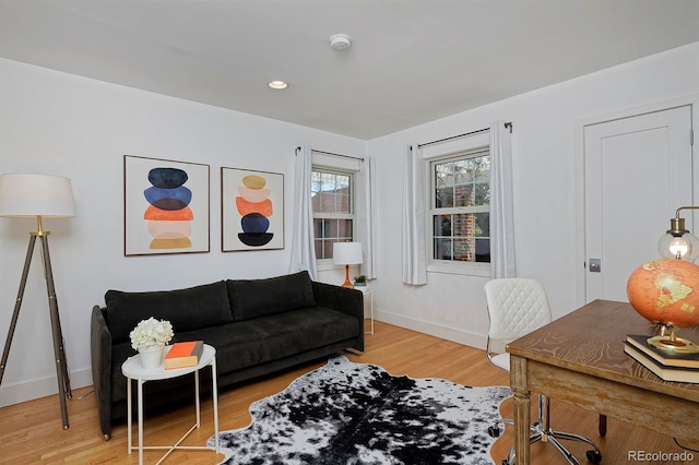 2500 Locust St, Denver, CO 80207 - living room with light wood-style floors, baseboards, and recessed lighting