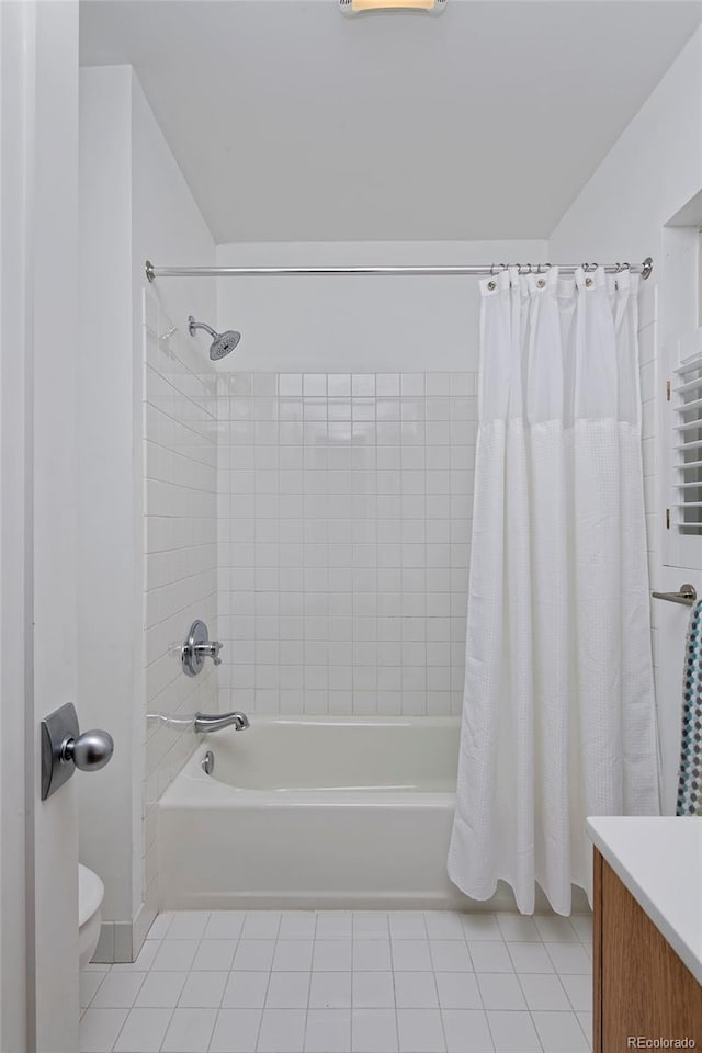 2500 Locust St, Denver, CO 80207 - bathroom with tile patterned floors, shower / bathtub combination with curtain, toilet, and vanity