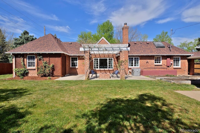 2500 Locust St, Denver, CO 80207 - rear view of house featuring a chimney, a patio area, brick siding, a pergola, and a shingled roof