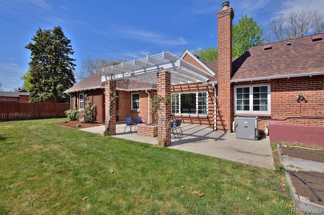 2500 Locust St, Denver, CO 80207 - back of property featuring a chimney, a pergola, brick siding, and a patio area