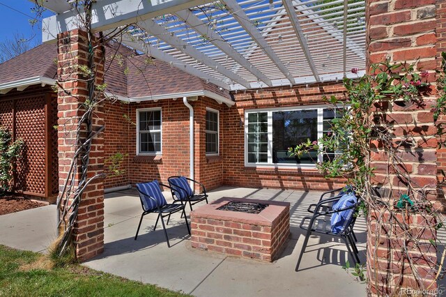 2500 Locust St, Denver, CO 80207 - view of patio / terrace featuring an outdoor fire pit and a pergola