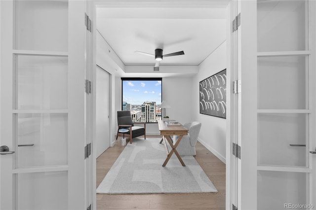 1750 Wewatta St Unit 1301, Denver, CO 80202 - office with a ceiling fan and wood finished floors