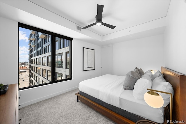 1750 Wewatta St Unit 1301, Denver, CO 80202 - carpeted bedroom with baseboards and ceiling fan
