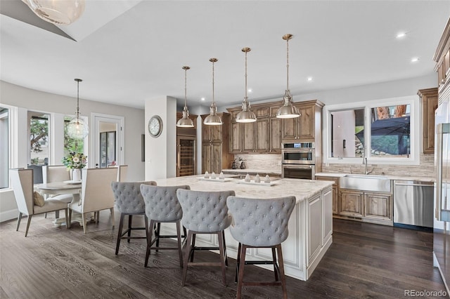 22454 Anasazi Way, Golden, CO 80401 - kitchen featuring appliances with stainless steel finishes, wine cooler, backsplash, dark wood finished floors, and recessed lighting