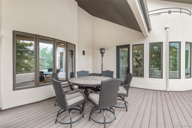 22454 Anasazi Way, Golden, CO 80401 - wooden terrace with outdoor dining area