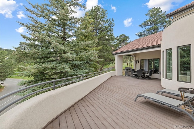 22454 Anasazi Way, Golden, CO 80401 - wooden terrace featuring outdoor dining area