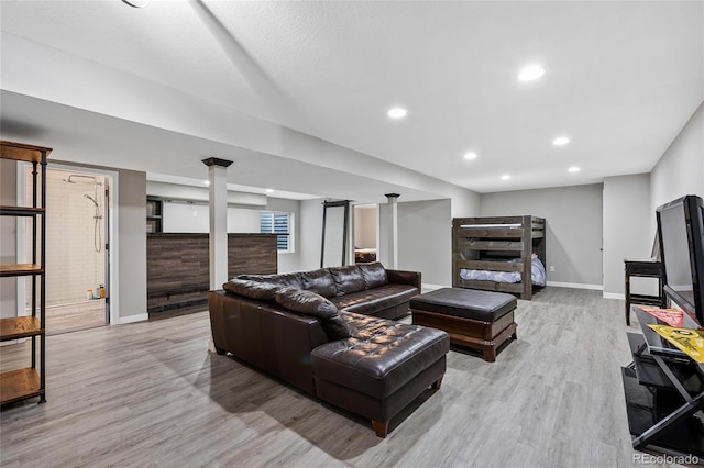 living room with light hardwood / wood-style floors