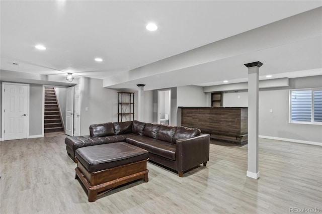 living room with light hardwood / wood-style floors