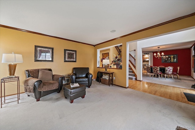 living area featuring carpet floors, crown molding, stairs, baseboards, and a chandelier