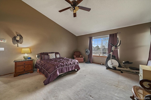 bedroom with carpet flooring, ceiling fan, baseboards, and lofted ceiling