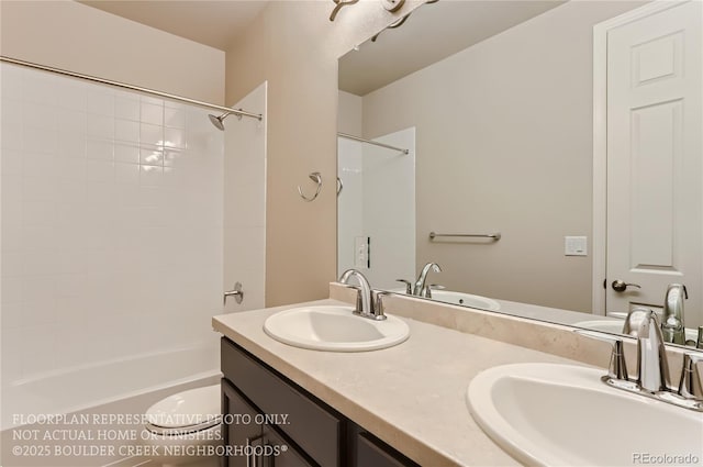 full bath featuring double vanity, a sink, and washtub / shower combination