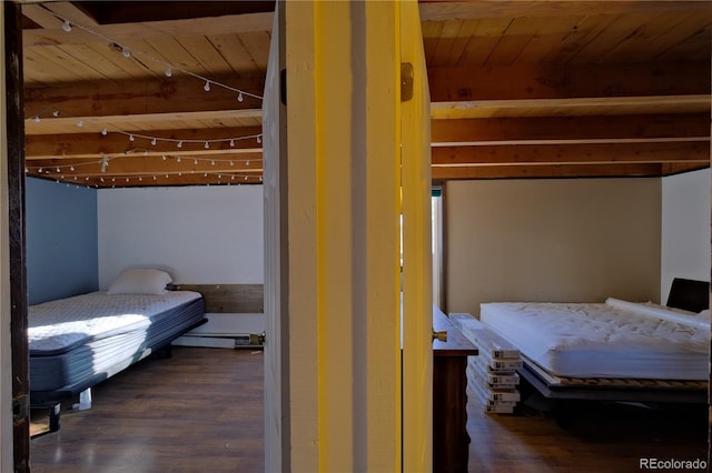 bedroom featuring wooden ceiling, dark wood-type flooring, a baseboard radiator, and beamed ceiling