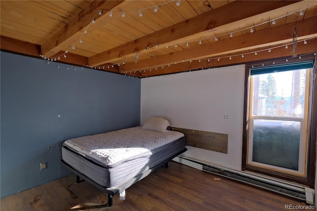 bedroom with beam ceiling, baseboard heating, dark hardwood / wood-style flooring, and rail lighting