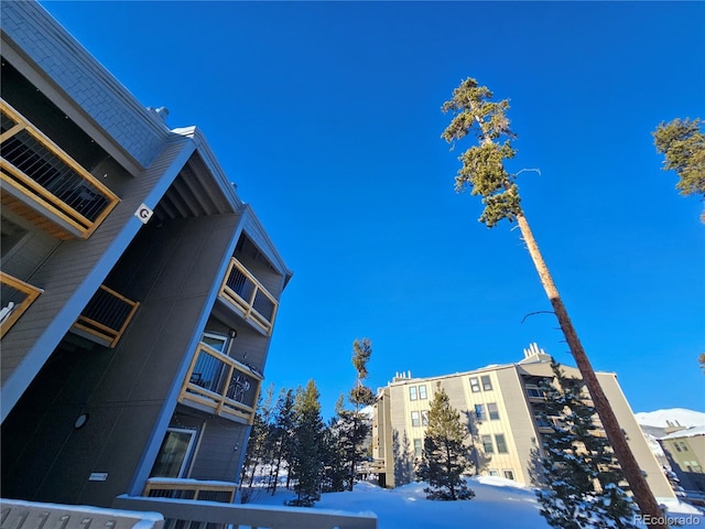 view of snow covered property