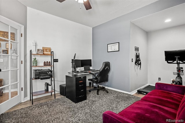 office with ceiling fan and hardwood / wood-style floors