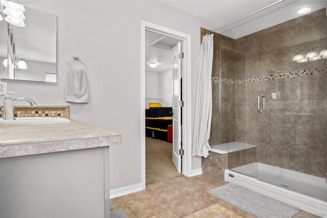 bathroom featuring curtained shower, tile patterned flooring, and vanity