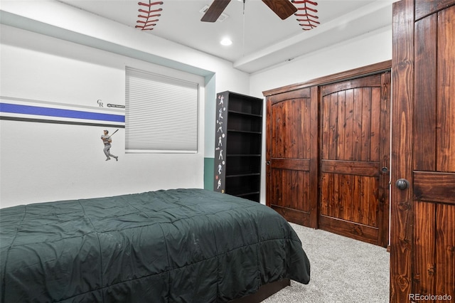 carpeted bedroom featuring ceiling fan