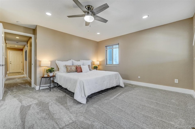 carpeted bedroom featuring ceiling fan