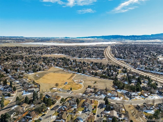 birds eye view of property featuring a mountain view