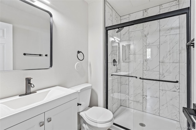 6800 E Tennessee Ave Unit 541, Denver, CO 80224 - full bath with a stall shower, toilet, and vanity