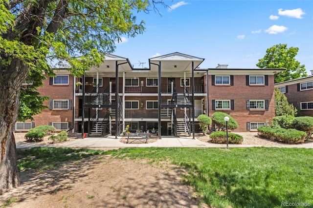 6800 E Tennessee Ave Unit 541, Denver, CO 80224 - view of building exterior featuring stairs