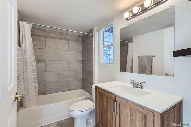 full bathroom featuring toilet, shower / bath combo, and vanity