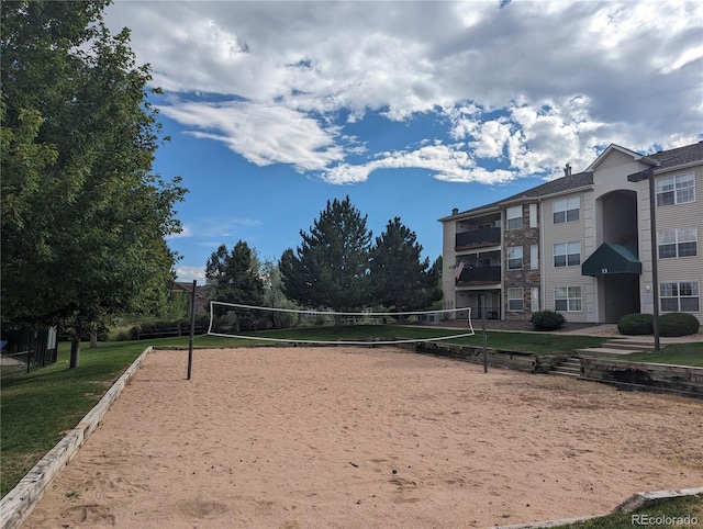 view of property's community featuring volleyball court