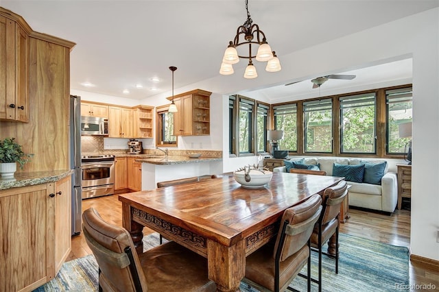180 Nottingham Rd Unit C, Avon, CO 81620 - dining area featuring plenty of natural light, light wood-type flooring, a ceiling fan, and recessed lighting