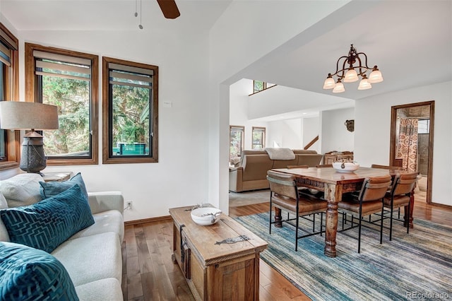 180 Nottingham Rd Unit C, Avon, CO 81620 - living area with wood finished floors, a chandelier, lofted ceiling, and ceiling fan