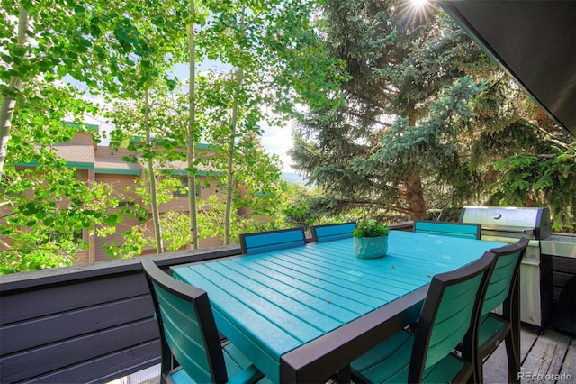 180 Nottingham Rd Unit C, Avon, CO 81620 - wooden terrace with outdoor dining space