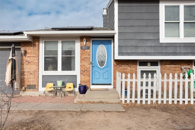 property entrance with solar panels