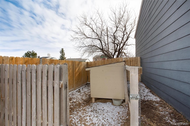 view of yard layered in snow