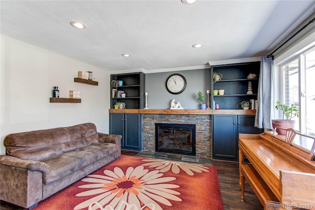 living room featuring recessed lighting, a fireplace, and dark wood-type flooring