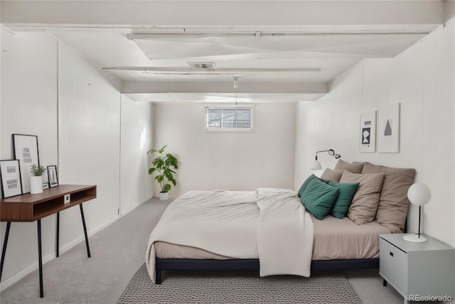 bedroom with carpet floors and visible vents