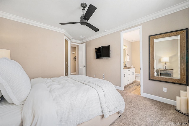 3480 Mount Powell Dr, Broomfield, CO 80023 - bedroom with crown molding, baseboards, ensuite bathroom, ceiling fan, and light colored carpet