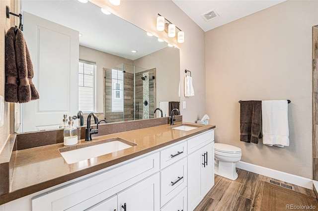 3480 Mount Powell Dr, Broomfield, CO 80023 - bathroom featuring a sink, a shower stall, and visible vents