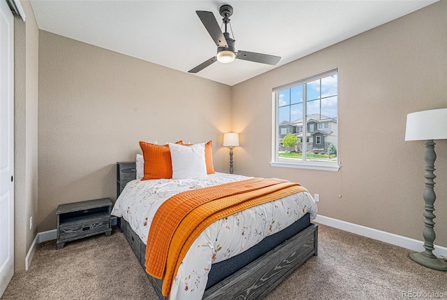3480 Mount Powell Dr, Broomfield, CO 80023 - carpeted bedroom featuring a ceiling fan and baseboards