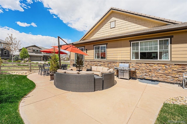 3480 Mount Powell Dr, Broomfield, CO 80023 - view of patio / terrace with fence, an outdoor living space, and a grill