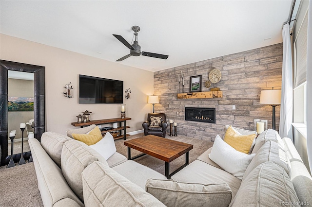 3480 Mount Powell Dr, Broomfield, CO 80023 - living area with carpet floors, a ceiling fan, baseboards, and a fireplace